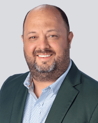 John Smith, President of The Tessman Company